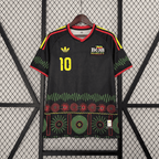 Јамајка 2026 - Гостински дрес „Bob Marley“