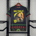Јамајка 2026 - Гостински дрес „Bob Marley“